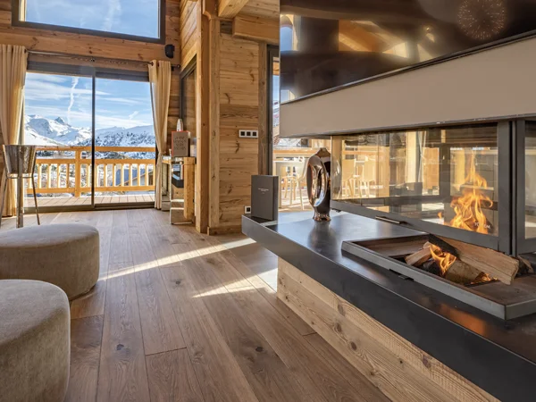 Rental Alpes d'Huez, living room fireplace chalet Le Subtil